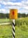 Warning sign in the border strip